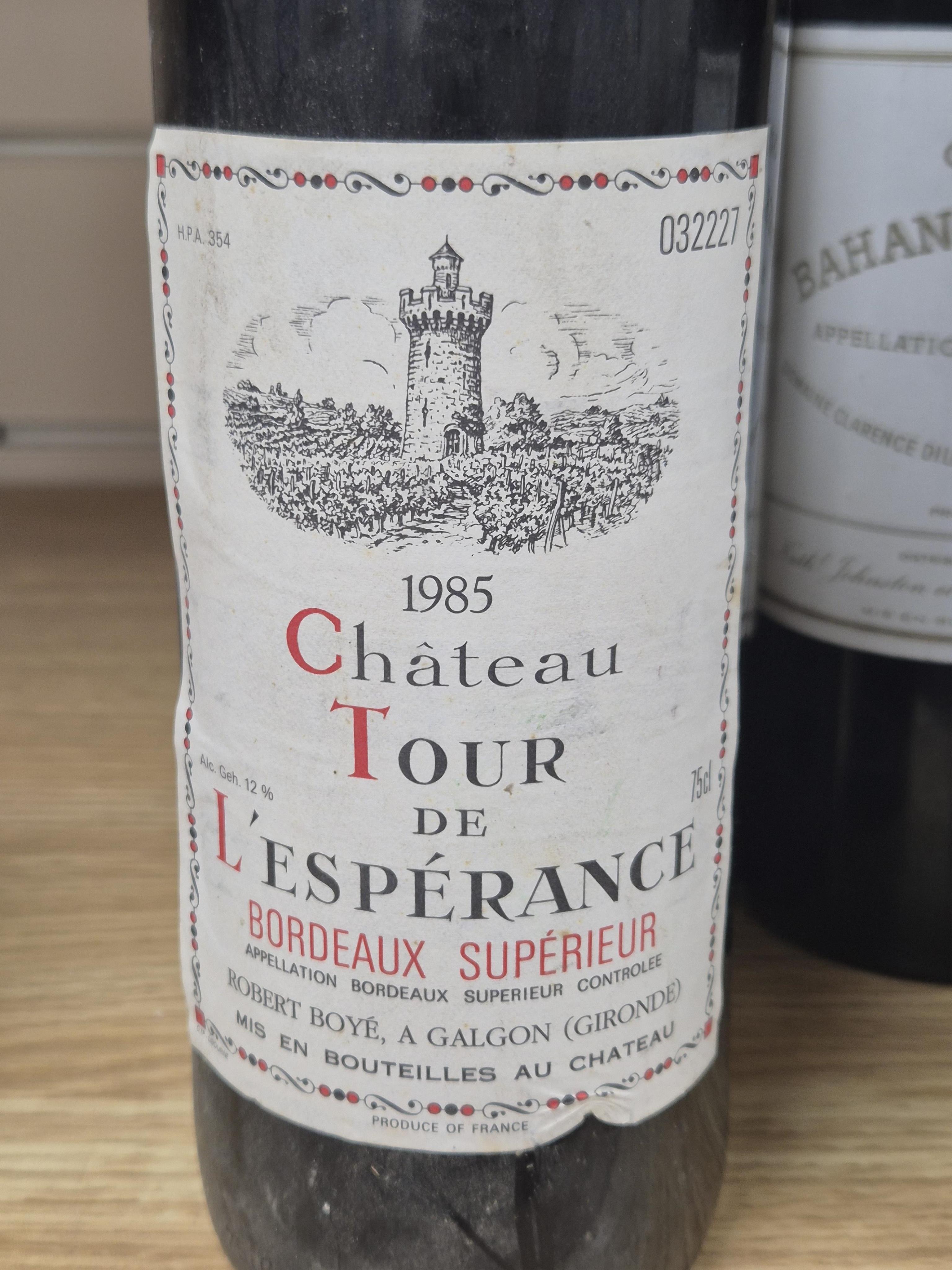Four bottles of Bordeaux red wine comprising three Chateau Bahans Haut-Brion, 1985 and one Chateau Tour de L'Esperance, 1985